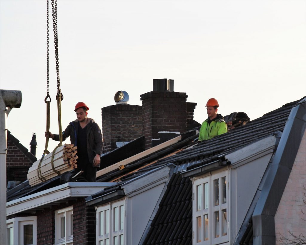 Roof of an old house being fixed